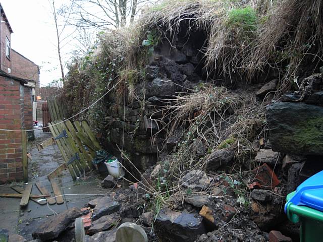 Families living on Whitfield Brow off of Todmorden Road, Littleborough forced out of their homes due to landslide