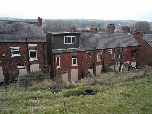 Families living on Whitfield Brow off of Todmorden Road, Littleborough forced out of their homes due to landslide