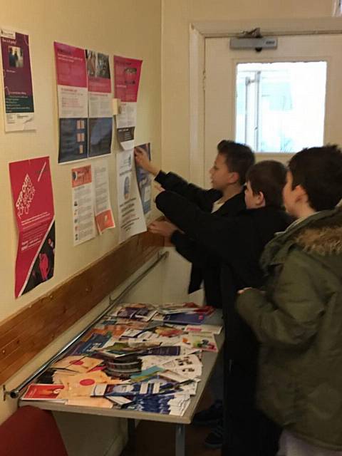 7th A Rochdale Cubs help tidy up Spotland Community Centre