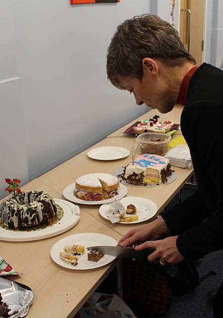 Headteacher Gill Middlemas samples the staff Bake Off entries