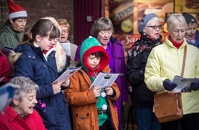 Carol singers from Churches Together in North West Rochdale at Cutgate Precinct