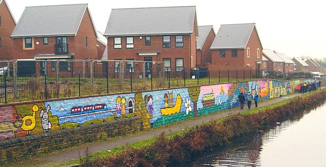 St Edwards children's mural on the tow path of Rochdale Canal in Castleton