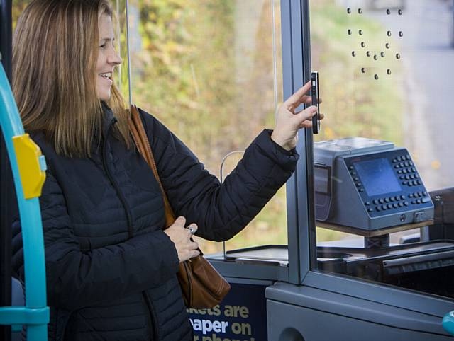 First Bus customer paying via m-Ticket app