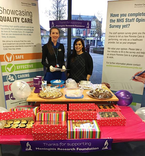 Cake bake at Dr Hamid's Practice with Office Manager Helena Lees next to Practice Manager Sahda Ali