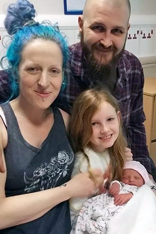 Louise Marcroft and Daniel Isler with daughters Dion-Rose and new-born Leona Joy