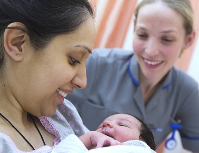 Jennifer Sager, lead midwife/infant feeding co-ordinator with new mum Nabeela Khan from Rochdale