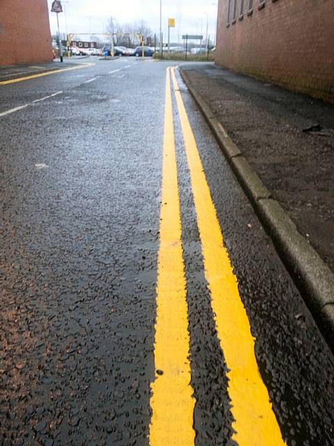 Double yellow lines painted on Sarah Street