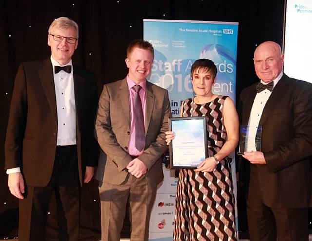 Rebecca Chadwick receives the Allied Health Professional / Technical / Scientific Worker of the Year Award from Trust chief executive Sir David Dalton, Trust chairman Jim Potter 