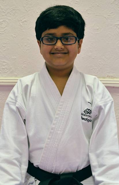 Saarim Khan, Black Belt	