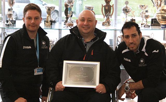 Sports Arena team with their certificate Tom Conroy, Terry Morley (Centre Director) Paul Driver