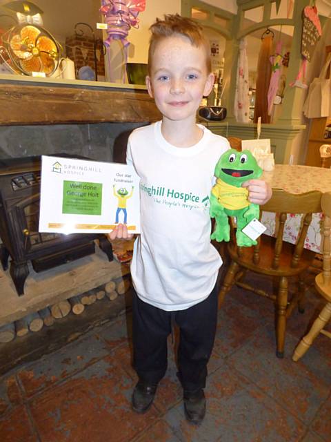 George Holt swims a mile for Springhill Hospice and raised an incredible £541.10