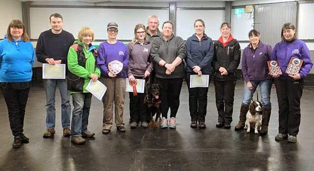 Judge Julie Rowlands, Richard, Heather, Chris (team co-ordinator), Aimee, Martyn, Roz, Emily, Joanne, Marie and Cath Phillips, head trainer at On Track Dog Training Club 