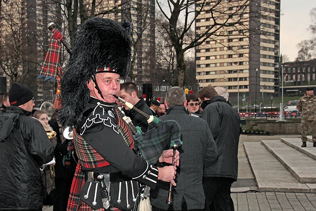 A piper at the Cenotaph service commemorating the end of Gulf War