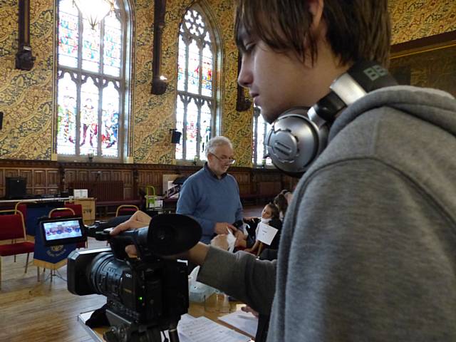 Finley Chadwick at work filming in the Grade I listed Rochdale Town Hall