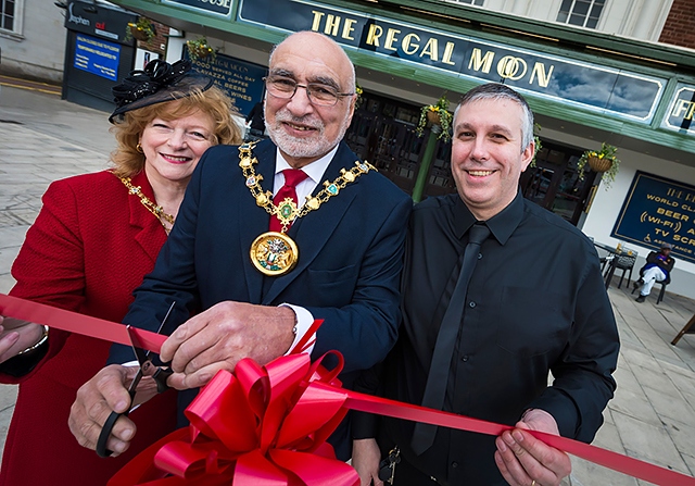 The Mayor and Mayoress, Surinder and Cecile Biant, cut the ribbon with Regal Moon manager Chris Riley