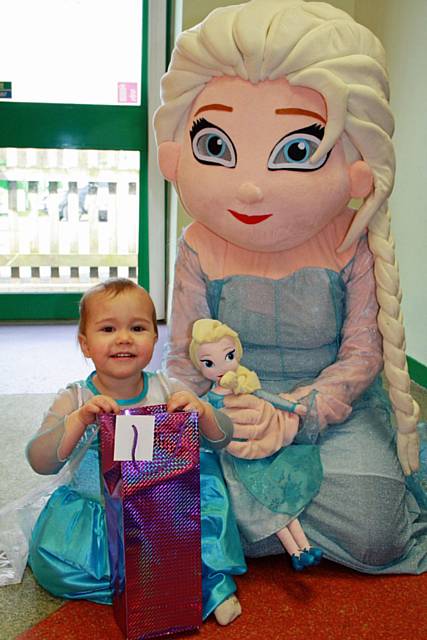 Two-year-old Grace brought along a friend to enjoy the fun, Elsa from the Disney film Frozen