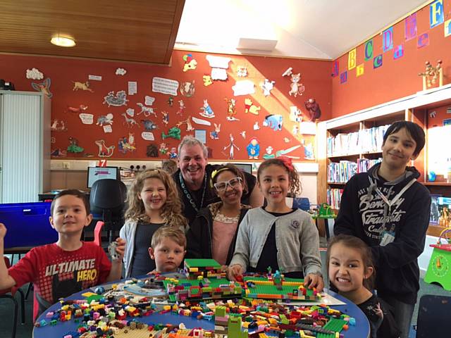 Youngsters launch the new Lego club at Balderstone Library with local councillor Richard Farnell and volunteer helper Thomas Wilcox