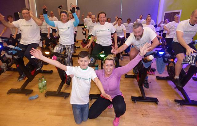 Shelly Burns and cyclists at the Spin-a-thon 