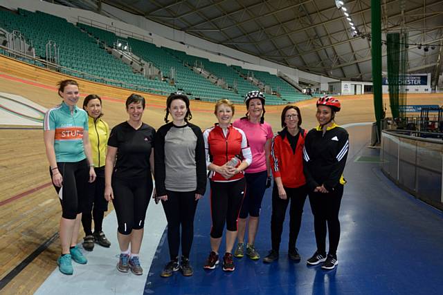 A group of cyclists take a break from a taster session at the Velodrome