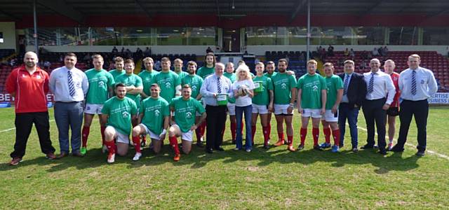 The Green Hornets line up with pride to support Springhill Hospice