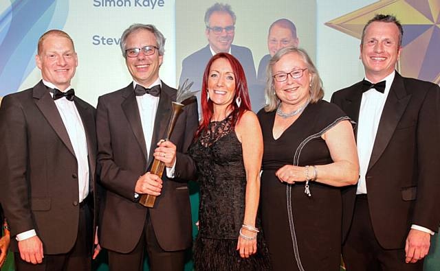 Members of the Pennine Acute Hospitals NHS Trust collect the award