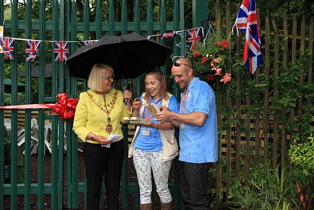 Mayor of Whitworth, Madeline De Souza, with Hopwood Hall Horticultural students Barbara Burke and Andy McConnell 