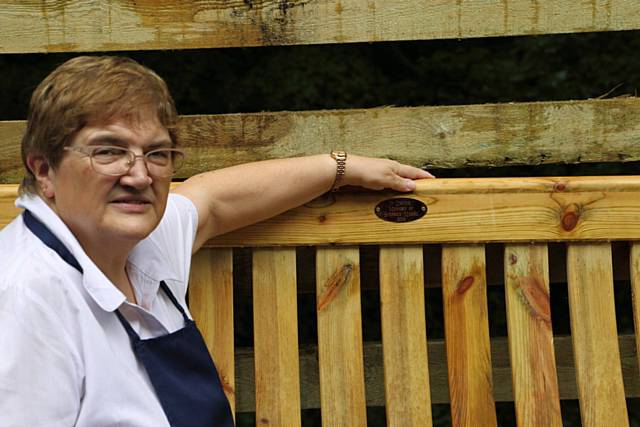 Lorraine Moore with her husband Stephen’s bench in The Riverside Tea Garden