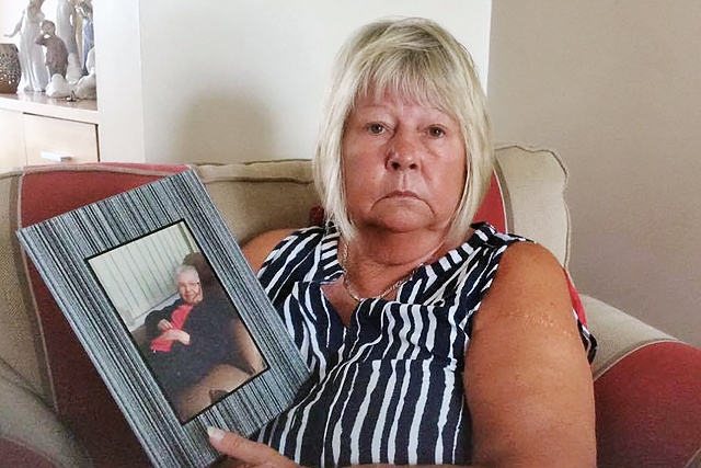 Sandra Grochowina with a photo of her late mother, Mabel McRonald