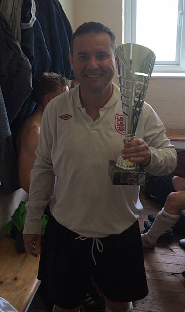 Littlebourgh Vets player/manager Dave Smeaton with the Trophy