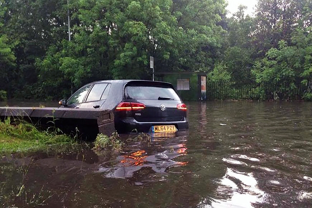 A car submerged in the flooding in Middleton