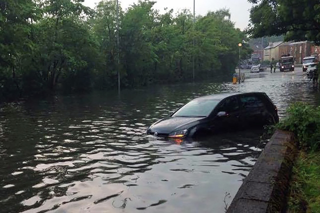 A car submerged in the flooding in Middleton