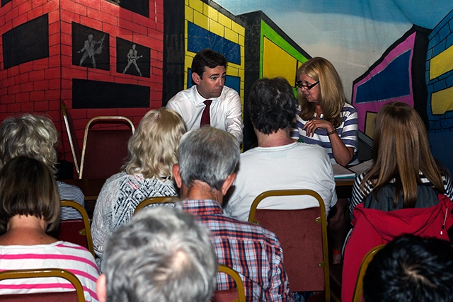 Andy Burnham sat with Olwen Stevenson, CLP Member's Officer, addresses a meeting a Rochdale Labour Club