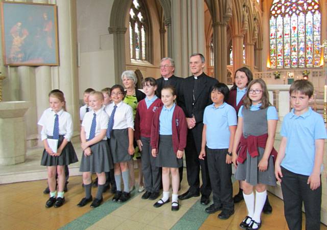 Students from Sacred Heart Primary and St Vincent’s De Paul Primary in Rochdale, join Bishop John Arnold and Father David Glover  to celebrate Mass 