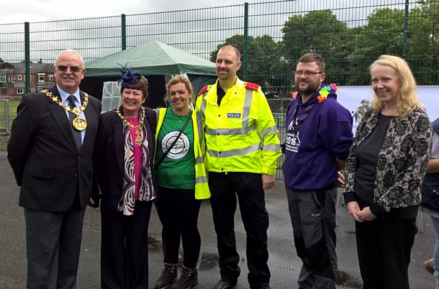 Mayor and Mayoress of Rochdale, Sandra Trickett, Inspector Fern, Steve McNee from Heywood Scouts and MP Liz Mcciness