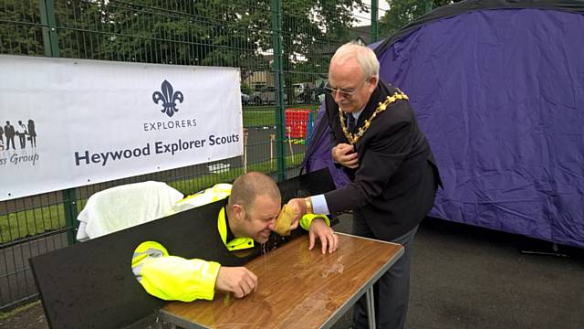 Mayor Raymond Dutton puts Inspector Fern in the stocks