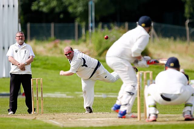 Dale Highton bowling for Rochdale