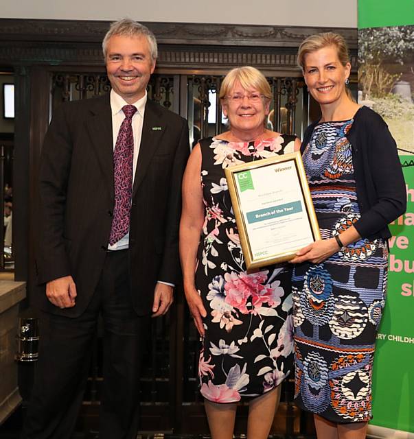 NSPCC Rochdale Branch Chair, Merilyn Chadwick, being presented with the Branch of the Year award by Royal Patron of ChildLine and NSPCC President, HRH The Countess of Wessex, alongside NSPCC Chief Executive Peter Wanless