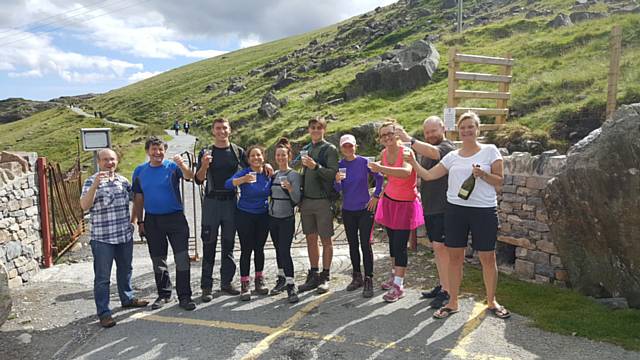 Hopwood Hall College employees who completed the National Three Peaks Challenge at the start of the challenge and at the end