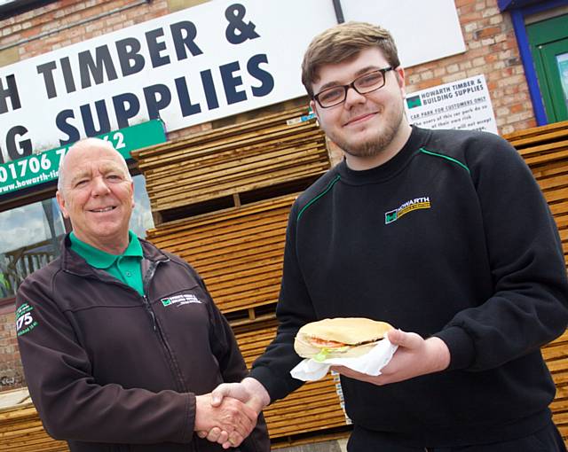 Howarth Timber Assistant manager Pete Barber with Dylan Remnant