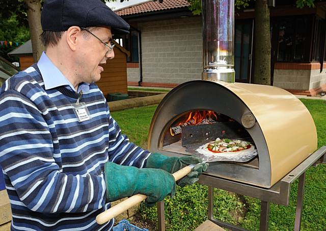 Handmade pizza topped with veg grown in the gardens and baked in a wood fired oven at the Springhill Hospice Open Garden Day