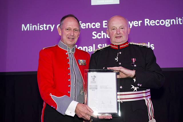 Pennine Care army reservist Phil Broad with Warren Smith, Her Majesty’s Lord-Lieutenant for Greater Manchester