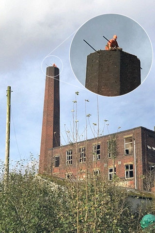 Work to reduce the height of a chimney at the former Dexine Rubber Mill in Spotland has begun.