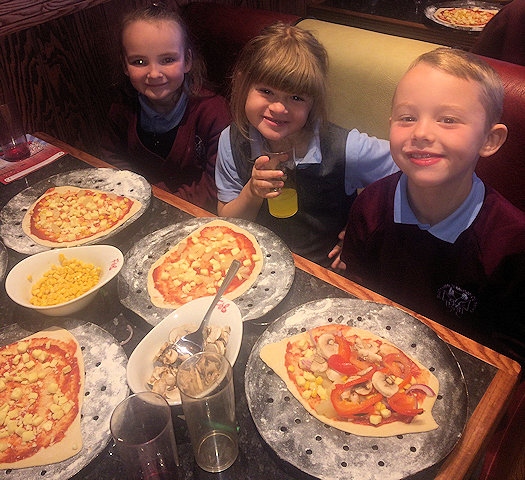 St John with St Michael children make pizzas at Frankie and Bennys