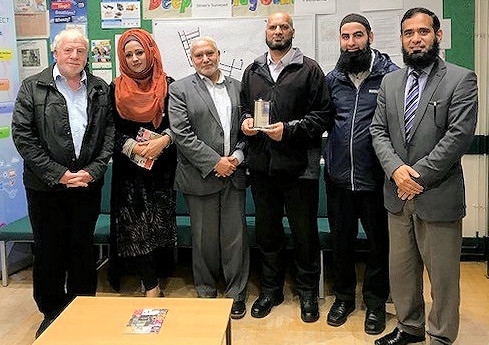 Councillors Mohammed Zaman and Alan Brett presented an Award to Mohammed Sarwar Alam for his community transport work