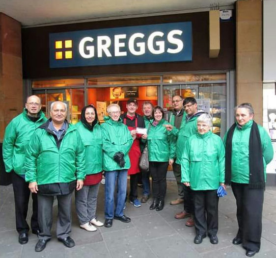 Stuart Eccles, branch manager of Greggs, Christine Mathewson along with other group members