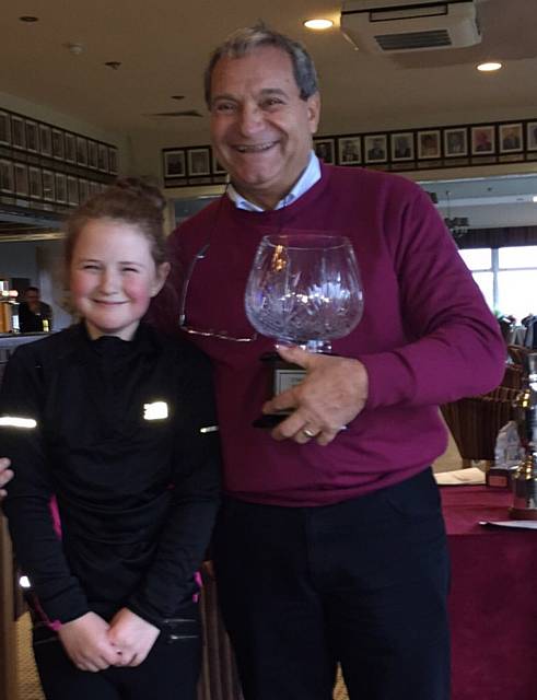 Emily Halstead receiving the Alan and Tony Trophy from Tony Coluccio 