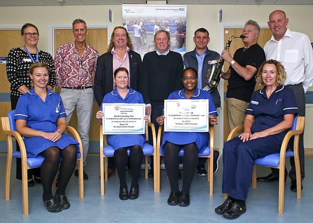 Mike Kershaw with staff from The Royal Oldham Hospital