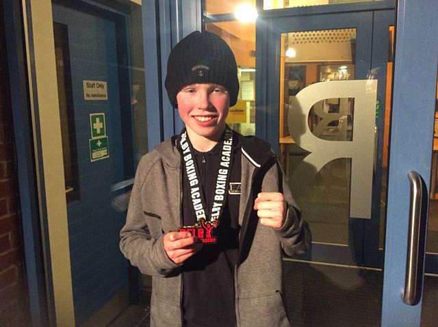 Aeron Maddocks with winners medal