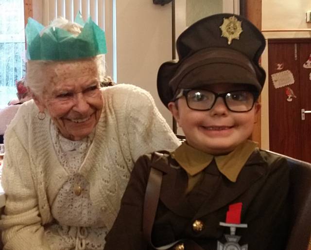 Nathan Edge giving out presents to the guests at the Thrum Hall Methodist Church Christmas Day Dinner
