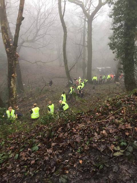 80 volunteers retrieve 700 tyres up a steep embankment to Ashworth Road 